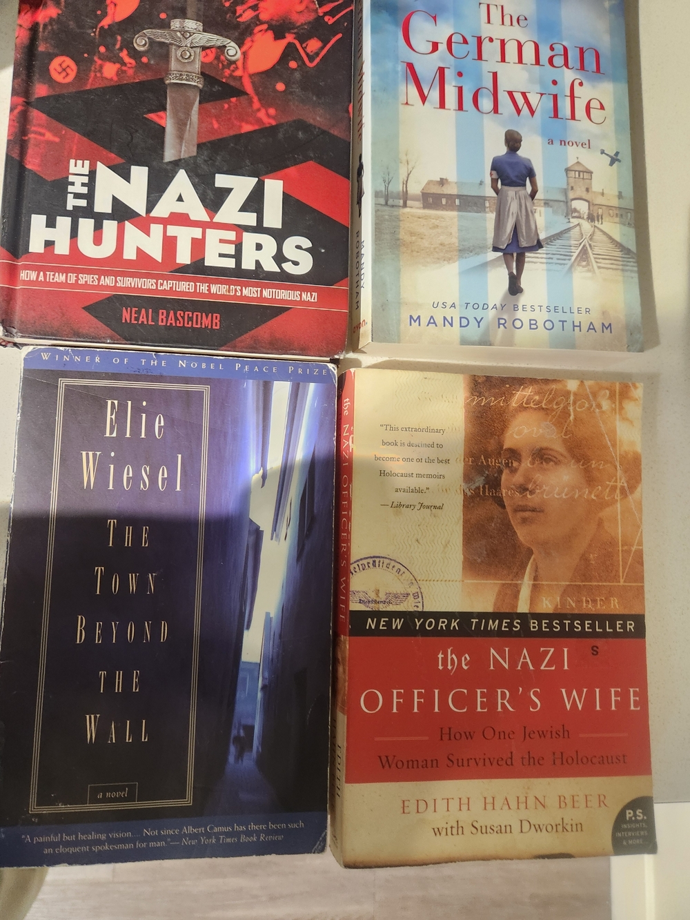 4 Books The Nazi Hunters, The German Midwife, The Nazi Officers Wife & The Town